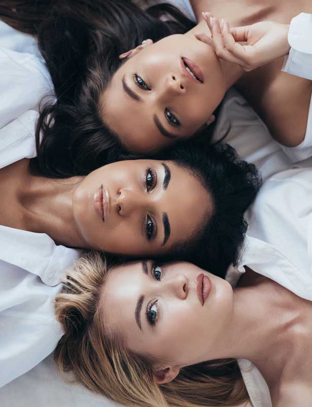 three women lying down